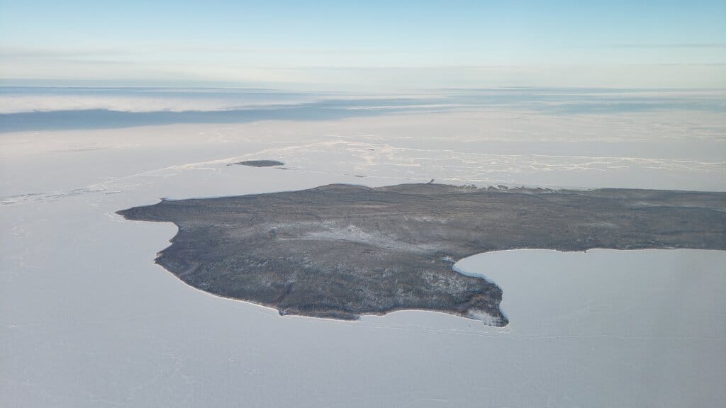 Aerial photograph of land and water